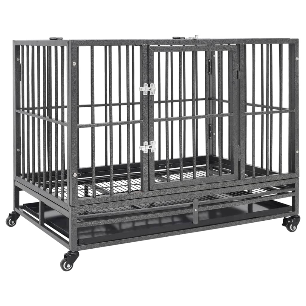 Black steel dog crate with hinged front door, removable tray and four caster wheels, angled view on white background